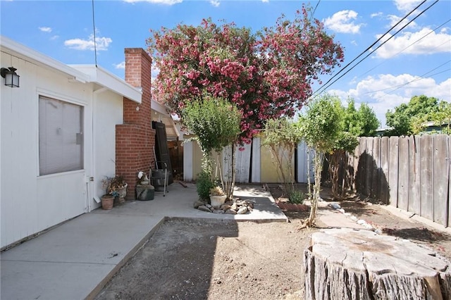 1625 Rose Ave, Merced, CA 95341 - fenced backyard featuring a patio area