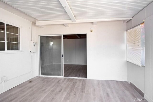 1625 Rose Ave, Merced, CA 95341 - unfurnished sunroom featuring beam ceiling