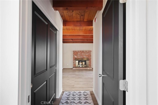 1625 Rose Ave, Merced, CA 95341 - corridor with a wooden ceiling with exposed beams and dark wood finished floors