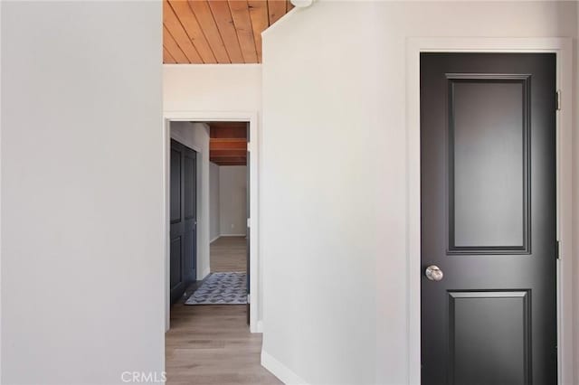 1625 Rose Ave, Merced, CA 95341 - corridor with wooden ceiling and wood finished floors