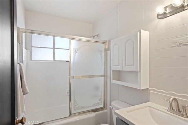 1625 Rose Ave, Merced, CA 95341 - bathroom featuring combined bath / shower with glass door and vanity