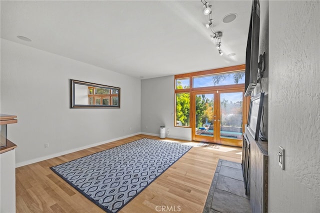 4 Woodhaven, Laguna Niguel, CA 92677 - entryway with wood finished floors, french doors, and track lighting