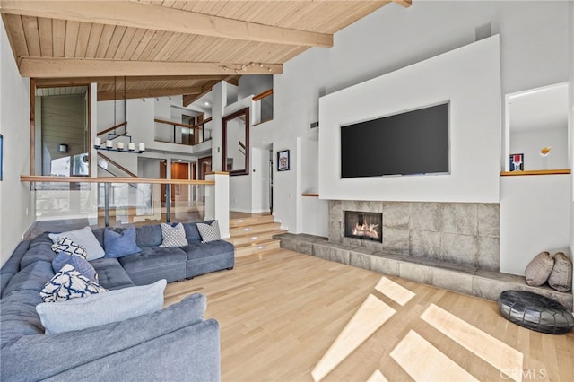 4 Woodhaven, Laguna Niguel, CA 92677 - living room with wooden ceiling, wood finished floors, a tile fireplace, and stairway
