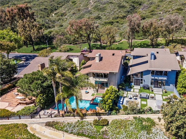 4 Woodhaven, Laguna Niguel, CA 92677 - view of subject property featuring a pool and a heavily wooded area