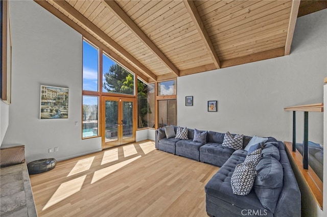 4 Woodhaven, Laguna Niguel, CA 92677 - living room featuring french doors, a wood ceiling with exposed beams, wood finished floors, and high vaulted ceiling