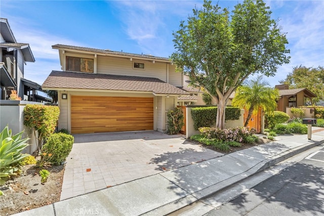 4 Woodhaven, Laguna Niguel, CA 92677 - view of front of home with a garage and driveway