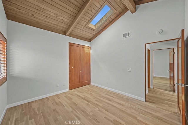 4 Woodhaven, Laguna Niguel, CA 92677 - unfurnished room with a skylight, beam ceiling, light wood-type flooring, high vaulted ceiling, and a smoke detector