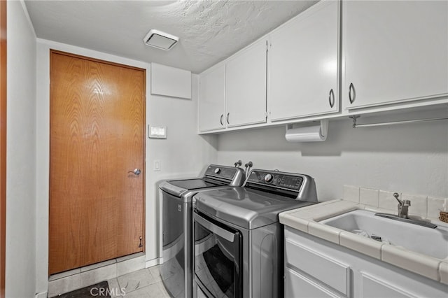 4 Woodhaven, Laguna Niguel, CA 92677 - laundry room featuring cabinet space and washing machine and dryer
