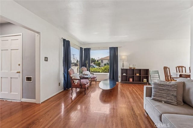 5801 Repetto Ave, East Los Angeles, CA 90022 - living area featuring wood finished floors and baseboards