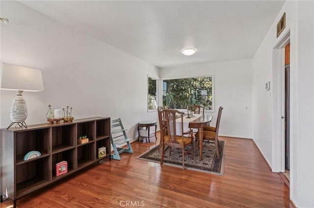 5801 Repetto Ave, East Los Angeles, CA 90022 - dining room featuring wood finished floors