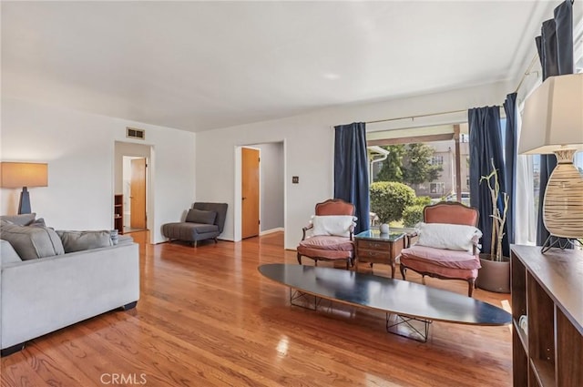 5801 Repetto Ave, East Los Angeles, CA 90022 - living room featuring wood finished floors
