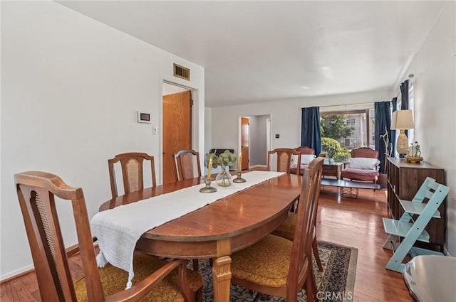 5801 Repetto Ave, East Los Angeles, CA 90022 - dining space featuring wood finished floors