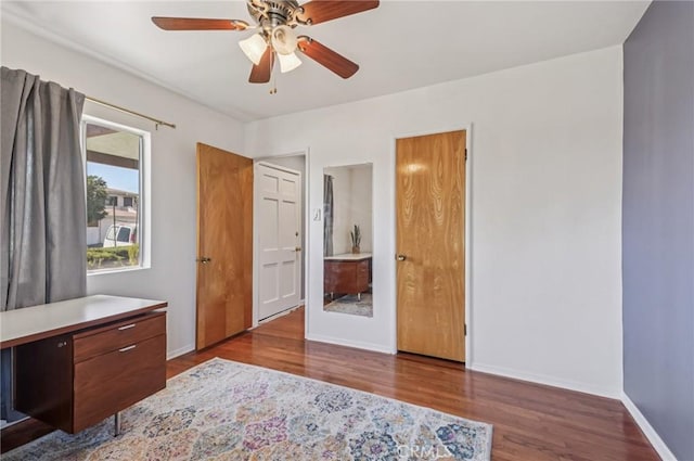 5801 Repetto Ave, East Los Angeles, CA 90022 - bedroom with wood finished floors and a ceiling fan