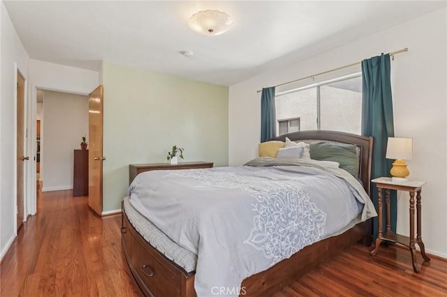 5801 Repetto Ave, East Los Angeles, CA 90022 - bedroom featuring wood finished floors and baseboards
