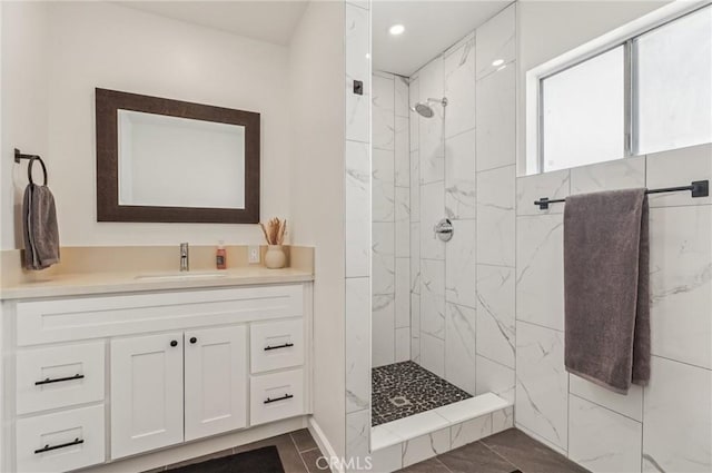 5801 Repetto Ave, East Los Angeles, CA 90022 - full bathroom with a marble finish shower, vanity, and recessed lighting