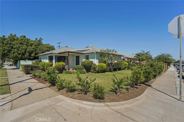 5801 Repetto Ave, East Los Angeles, CA 90022 - view of front of home featuring a front yard