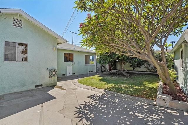 5801 Repetto Ave, East Los Angeles, CA 90022 - back of house with a patio area and stucco siding