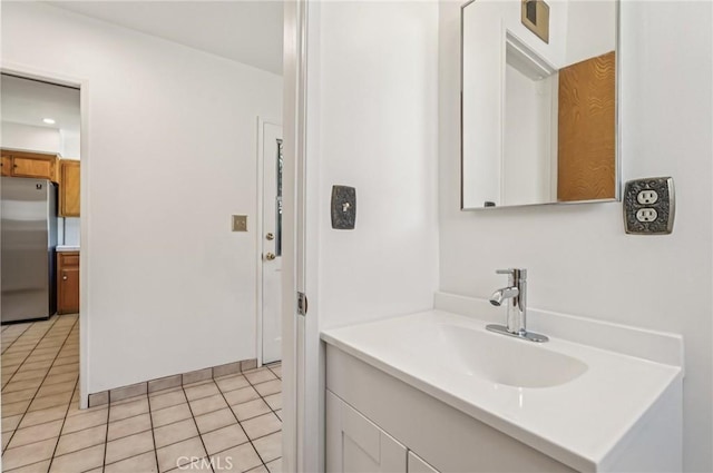 5801 Repetto Ave, East Los Angeles, CA 90022 - bathroom with vanity and tile patterned flooring