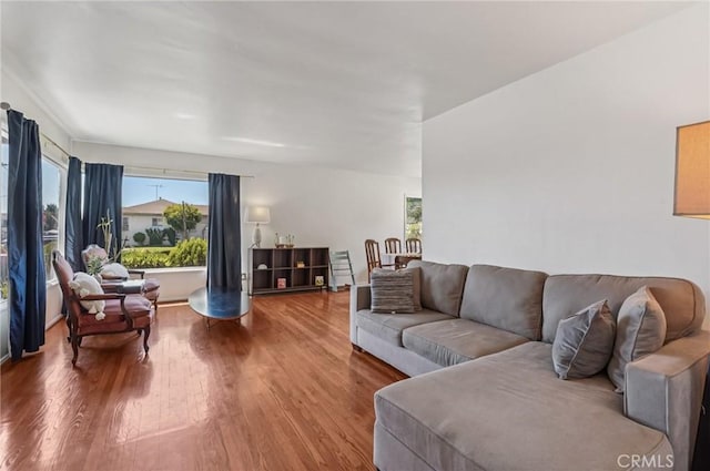 5801 Repetto Ave, East Los Angeles, CA 90022 - living room with plenty of natural light and wood finished floors