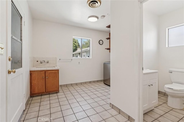 5801 Repetto Ave, East Los Angeles, CA 90022 - bathroom featuring vanity and tile patterned flooring