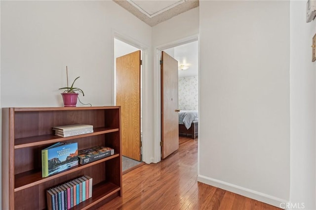 5801 Repetto Ave, East Los Angeles, CA 90022 - corridor featuring wood finished floors and baseboards
