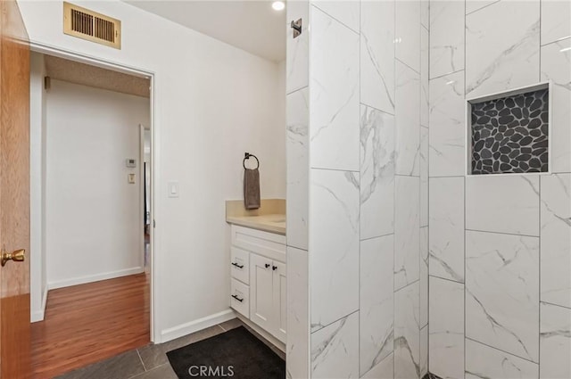5801 Repetto Ave, East Los Angeles, CA 90022 - full bath featuring vanity and a tile shower