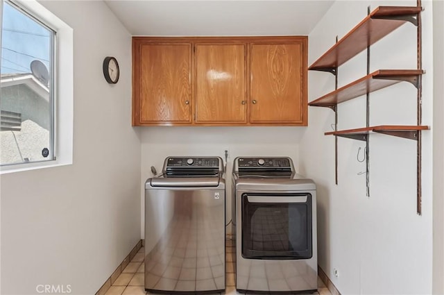 5801 Repetto Ave, East Los Angeles, CA 90022 - laundry area with cabinet space, independent washer and dryer, and healthy amount of natural light