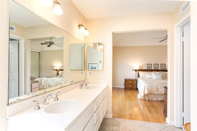 21094 Trailside Dr, Yorba Linda, CA 92887 - bathroom with ensuite bathroom, a ceiling fan, tile patterned flooring, and double vanity