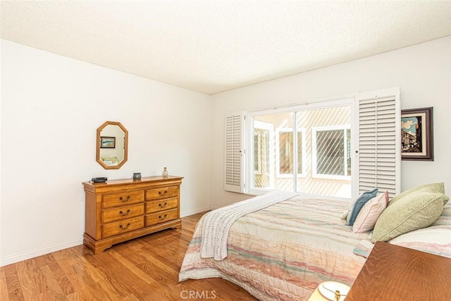 21094 Trailside Dr, Yorba Linda, CA 92887 - bedroom with wood finished floors and a textured ceiling