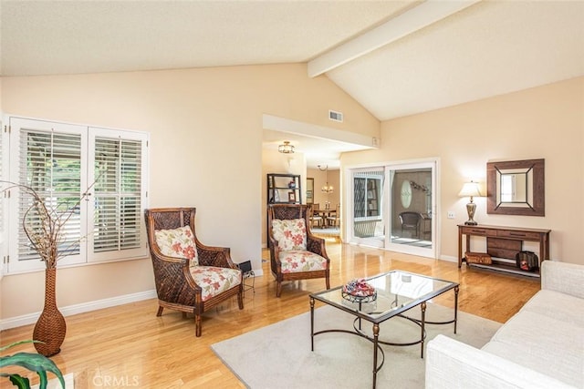 21094 Trailside Dr, Yorba Linda, CA 92887 - living area with light wood finished floors, high vaulted ceiling, and beamed ceiling