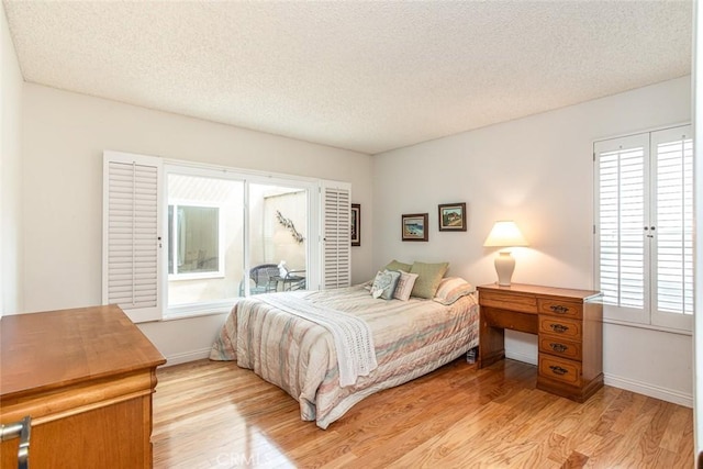 21094 Trailside Dr, Yorba Linda, CA 92887 - bedroom featuring light wood-type flooring and a textured ceiling