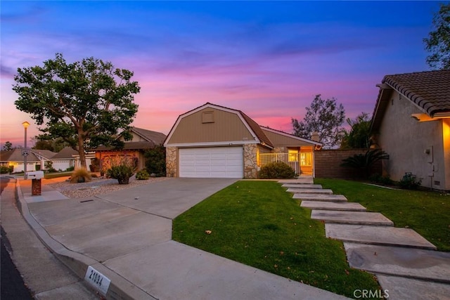21094 Trailside Dr, Yorba Linda, CA 92887 - view of front facade with stone siding, driveway, and a gambrel roof