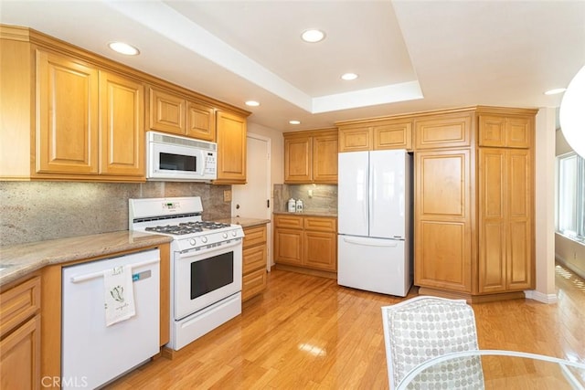 21094 Trailside Dr, Yorba Linda, CA 92887 - kitchen with white appliances, light wood-type flooring, tasteful backsplash, recessed lighting, and light stone counters