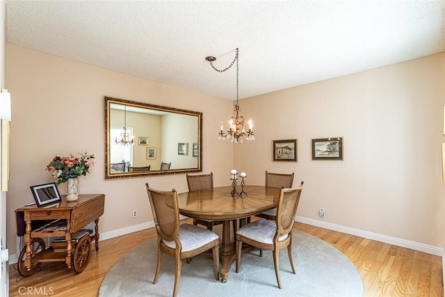 21094 Trailside Dr, Yorba Linda, CA 92887 - dining space with light wood finished floors and a chandelier