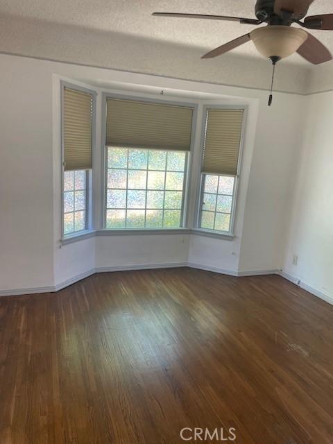 602 N Griffith Park Dr, Burbank, CA 91506 - unfurnished room featuring healthy amount of natural light, wood finished floors, and ceiling fan