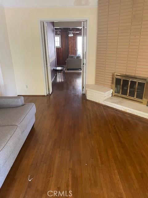 602 N Griffith Park Dr, Burbank, CA 91506 - living area featuring dark wood-style flooring and a large fireplace
