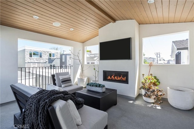 7141/2 Iris Ave, Newport Beach, CA 92625 - living area featuring wooden ceiling and a glass covered fireplace