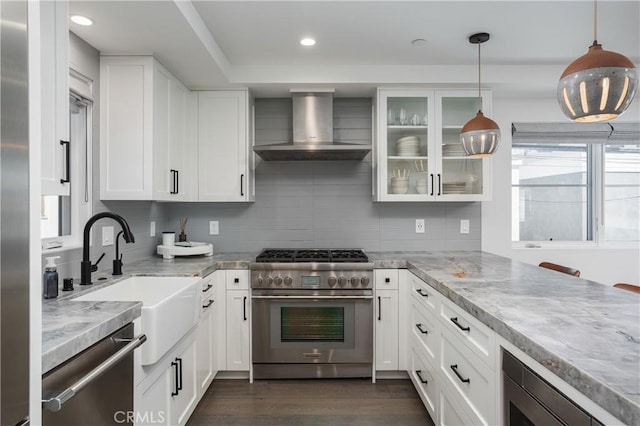 7141/2 Iris Ave, Newport Beach, CA 92625 - kitchen with wall chimney exhaust hood, stainless steel appliances, white cabinets, and recessed lighting