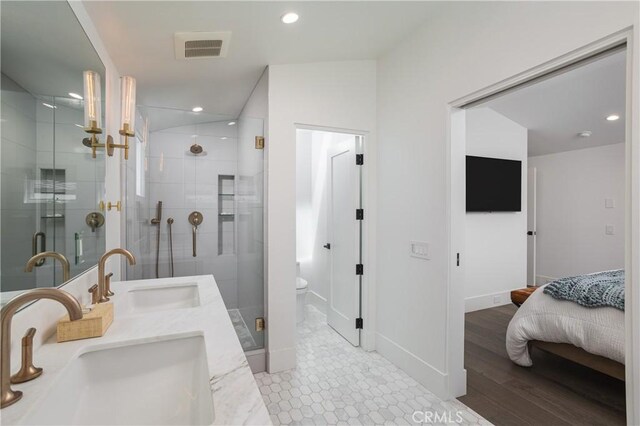 7141/2 Iris Ave, Newport Beach, CA 92625 - bathroom featuring a shower stall, double vanity, and recessed lighting