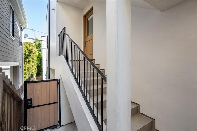 7141/2 Iris Ave, Newport Beach, CA 92625 - stairs featuring a towering ceiling