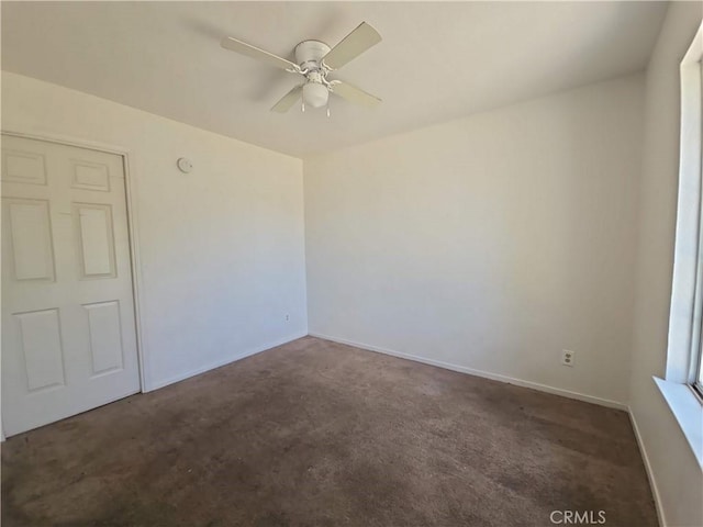 568 Walnut Ct, Kerman, CA 93630 - carpeted spare room featuring ceiling fan and baseboards