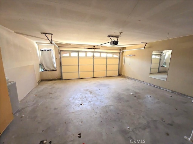 568 Walnut Ct, Kerman, CA 93630 - garage featuring a garage door opener