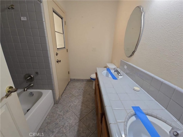 568 Walnut Ct, Kerman, CA 93630 - full bathroom with vanity and shower / bathtub combination