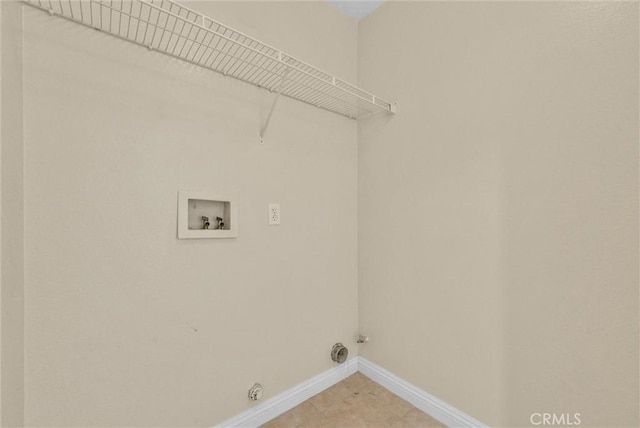 8305 Highridge Pl, Rancho Cucamonga, CA 91730 - laundry area with hookup for a gas dryer, washer hookup, and light tile patterned flooring