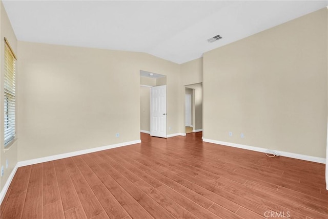 8305 Highridge Pl, Rancho Cucamonga, CA 91730 - spare room featuring wood finished floors and lofted ceiling