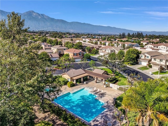 8305 Highridge Pl, Rancho Cucamonga, CA 91730 - aerial perspective of suburban area featuring mountains and a pool