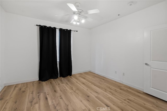 1801 E Katella Ave Unit 1091, Anaheim, CA 92805 - spare room featuring a smoke detector, light wood-style flooring, and ceiling fan