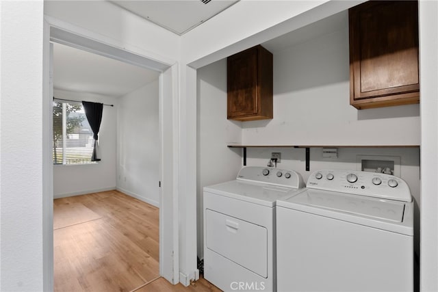 1801 E Katella Ave Unit 1091, Anaheim, CA 92805 - washroom with light wood finished floors and washing machine and clothes dryer
