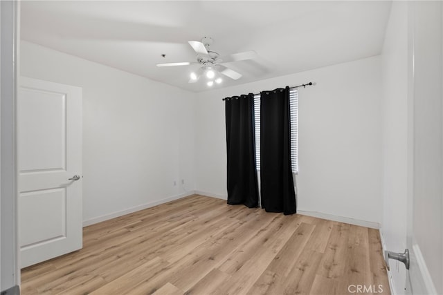 1801 E Katella Ave Unit 1091, Anaheim, CA 92805 - unfurnished room with light wood finished floors and ceiling fan