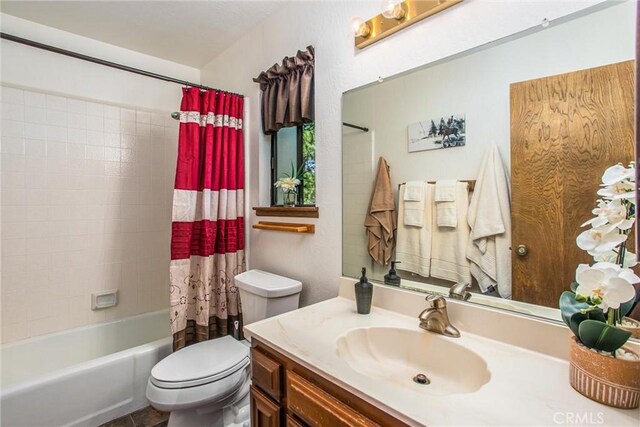 27657 Peninsula Dr, Lake Arrowhead, CA 92352 - bathroom with vanity and shower / bath combo with shower curtain